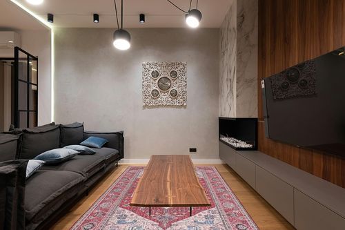 SAFAVIEH Tucson Collection Area Rug - 6' x 9', Red & Pink, Persian Design, Non-Shedding Machine Washable & Slip Resistant Ideal for High Traffic Areas in Living Room, Bedroom (TSN139R) in Dark Wood Living Room with Black Couch