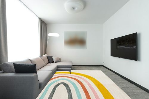 Unique Loom Whimsy Kids Collection Area Rug - Rainbow (7' 10" x 10' Rectangle, Ivory/Yellow) in Modern Living Room with Grey Couch