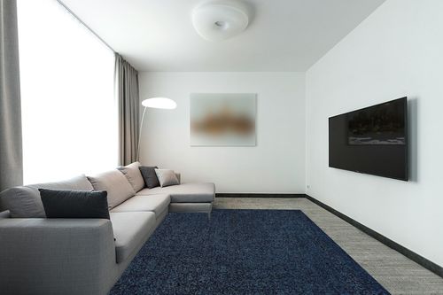 JONATHAN Y SEU100C-8 Haze Solid Low-Pile Indoor Area-Rug Casual Contemporary Solid Traditional Easy-Cleaning Bedroom Kitchen Living Room Non Shedding, 8 ft x 10 ft, Navy in Modern Living Room with Grey Couch