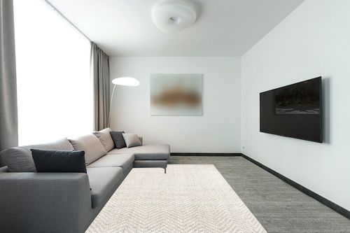nuLOOM Lisandra Casual Chevron Jute Area Rug, 6x9, Off-White in Modern Living Room with Grey Couch