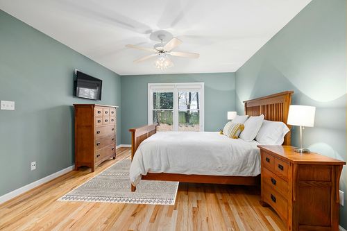 Mark&Day Outdoor Rugs, 5x7 Antibes Bohemian Indoor/Outdoor Black Area Rug, Non Shedding Black White Carpet for Patio, Porch, Deck, Bedroom, Living Room or Kitchen (5'3" x 7'7") in Teal and Orange Wood Bedroom