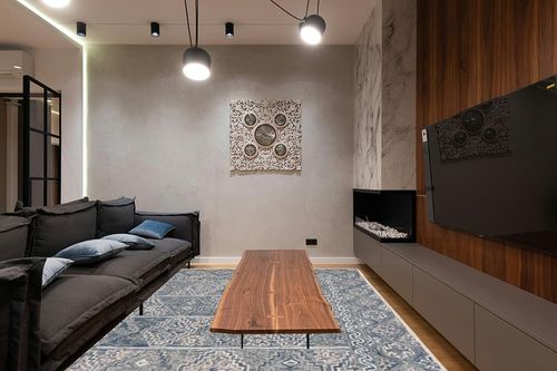 Safavieh Aspen Collection Area Rug - 9' x 12', Blue & Beige, Handmade Boho Wool, Ideal for High Traffic Areas in Living Room, Bedroom (APN275M) in Dark Wood Living Room with Black Couch