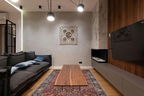 Valenrug Washable Rug 6x9 - Ultra-Thin Antique Collection Area Rug, Stain Resistant Rugs for Living Room Bedroom, Distressed Vintage Rug(Red, 6'x9') in Dark Wood Living Room with Black Couch