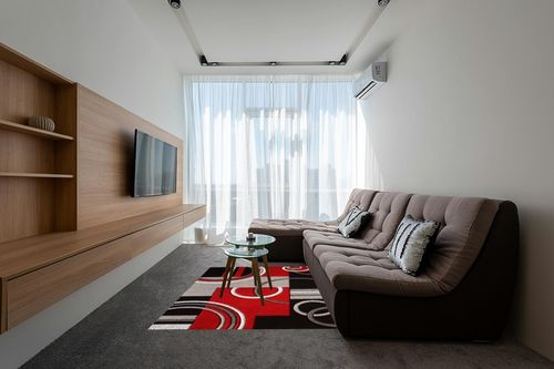 Red Modern Stain-resistant Living Room Area Rug in Grey Living Room with Brown Couch