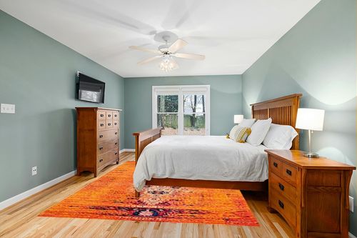 SAFAVIEH Monaco Collection Area Rug - 8' x 10', Orange & Multi, Modern Boho Abstract Distressed Design, Non-Shedding & Easy Care, Ideal for High Traffic Areas in Living Room, Bedroom (MNC209H) in Teal and Orange Wood Bedroom