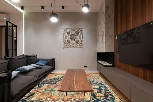 nuLOOM Tabetha Tribal Medallion Area Rug, 8' 10" x 12', Green in Dark Wood Living Room with Black Couch