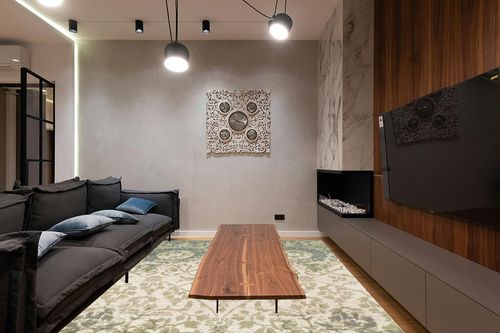 SUPERIOR Indoor Large Area Rug with Jute Backing, Vintage Floral Decor for Bedroom, Living Room, Kitchen, Dining, Office, Dorm, Entryway, Hardwood Floors, Pendleton Collection, 8' x 10', Multi- Color in Dark Wood Living Room with Black Couch