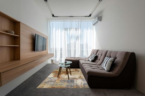 Haltwhistle Abstract Terracotta Area Rug 17 Stories Rug Size: Rectangle 5'3" x 7'8" in Grey Living Room with Brown Couch