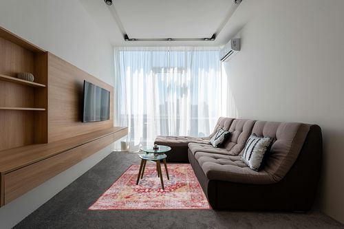 SAFAVIEH Tucson Collection Area Rug - 5' x 8', Rust & Gold, Persian Distressed Design, Non-Shedding Machine Washable & Slip Resistant Ideal for High Traffic Areas in Living Room, Bedroom (TSN131P) in Grey Living Room with Brown Couch