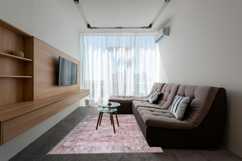 SAFAVIEH Tucson Collection Area Rug - 6' x 9', Pink & Beige, Persian Design, Non-Shedding Machine Washable & Slip Resistant Ideal for High Traffic Areas in Living Room, Bedroom (TSN144U) in Grey Living Room with Brown Couch