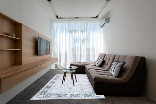 SAFAVIEH Arizona Collection Area Rug - 6' x 9', Light Grey & Grey Green, Machine Washable & Slip Resistant, Distressed Design, Ideal for High Traffic Areas in Living Room, Bedroom, Dining (ARZ118F-6) in Grey Living Room with Brown Couch