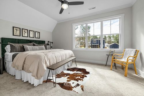 Sunshine Cowhides Genuine Tricolor Cowhide Rug - Luxurious Cow Rug for Bedroom, Living Room, and Home Decor Enthusiasts - Masterpiece of Style and Functionality - 6x6-7ft (180x220cm) in Grey Traditional Bedroom with King Bed