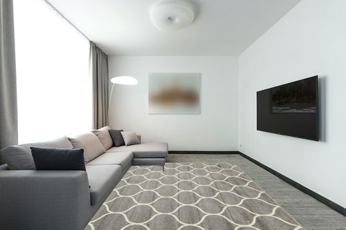 Unique Loom Trellis Frieze Collection Area Rug - Rounded (8' x 10', Light Gray/ Ivory) in Modern Living Room with Grey Couch