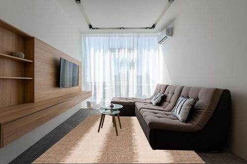 Rectangle Blythe Abstract Machine Woven Polypropylene/Polyester/Latex Indoor ... in Grey Living Room with Brown Couch