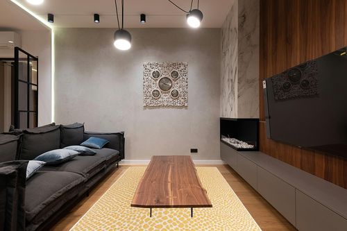 Unique Loom Jill Zarin Outdoor Collection Area Rug - Cape Town (6' x 9' Rectangle Yellow Ivory/Ivory) in Dark Wood Living Room with Black Couch