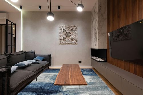 LUXE WEAVERS Contemporary Abstract Navy 8x10 Area Rug in Dark Wood Living Room with Black Couch
