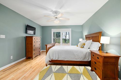Balta Levine Yellow 4 ft. 4 in. x 6 ft. Geometric Indoor Area Rug in Teal and Orange Wood Bedroom
