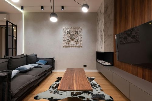 Appaloosa Cowhides Natural Cowhide Rug - Tricolor Cowhide Area Rug for Bedroom & Living Room - Luxury Cowhides Modern Accent Rug - Genuine Leather with Real Animal Fur, Original, 6 x 7 Feet in Dark Wood Living Room with Black Couch