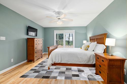 Sunshine Cowhides Cowhide Designer Rug Grey 9x11' in Teal and Orange Wood Bedroom
