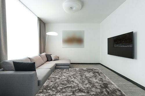 SAFAVIEH Ocean Shag Collection Area Rug - 8' x 10', Silver, Handmade Solid, 2.4-inch Thick Ideal for High Traffic Areas in Living Room, Bedroom (OCG101G) in Modern Living Room with Grey Couch