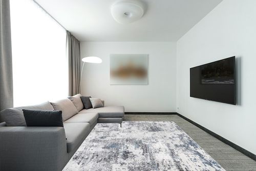 nuLOOM Dali Abstract Machine Washable Area Rug, 5x8, Grey in Modern Living Room with Grey Couch