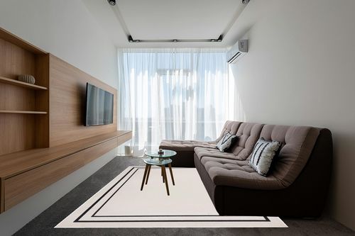 Nourison Essentials Indoor/Outdoor Solid Bordered Ivory/Black 8' x 10' Area Rug, Easy Cleaning, Non Shedding, Bed Room, Living Room, Dining Room, Backyard, Deck, Patio (8x10) in Grey Living Room with Brown Couch
