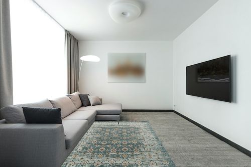 LUXE WEAVERS Bohemian Floral Blue 5x7 Area Rug, Non-Shedding Vintage Living Room Carpet in Modern Living Room with Grey Couch