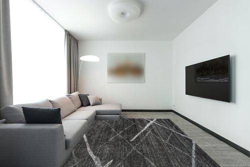 NuLOOM Thigpen Contemporary Area Rug, 7' 6" x 9' 6", Dark Grey in Modern Living Room with Grey Couch