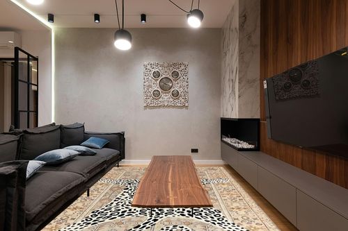 Restoration and Renovation Modern Leopard Wool Rug with Persian Background | Handmade, Animal Print Cheetah Area Carpet for Living Room, Bedroom and Kitchen Decor (5' x 8', Neutral) in Dark Wood Living Room with Black Couch
