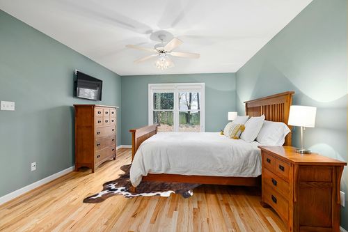 rodeo Classic Brown Brindle Cowhide Rug XXL 6x8 Ft in Teal and Orange Wood Bedroom