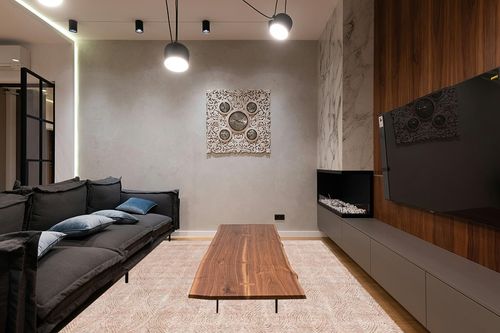 SAFAVIEH Abstract Collection Area Rug - 8' x 10', Ivory & Rust, Handmade Wool, Ideal for High Traffic Areas in Living Room, Bedroom (ABT340P) in Dark Wood Living Room with Black Couch