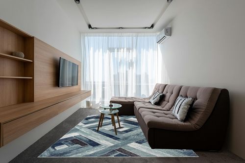 LUXE WEAVERS Modern Abstract Wood Carpet Geometric Blue 8x10 Area Rug in Grey Living Room with Brown Couch