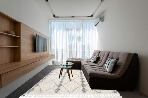 Geometric Beige Area Rug Dakota Fields Rug Size: Rectangle 7'10" x 11' in Grey Living Room with Brown Couch