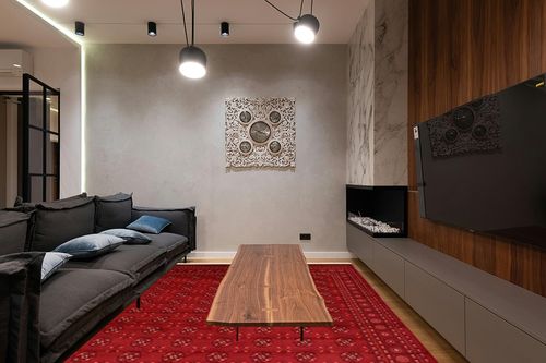 Unique Loom Tekke Collection Over-Dyed Saturated Traditional Torkaman Area Rug, 9 ft x 12 ft, Red/Burgundy in Dark Wood Living Room with Black Couch