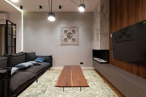 Unique Loom Tuareg Collection Area Rug - Sandstorm (8'x 10' Rectangle, Multi/ Gray) in Dark Wood Living Room with Black Couch