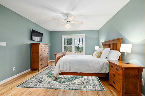 zesthome 8x10 Area Rugs,Stain Resistant Washable Rug,Ultra-Thin Rugs for Living Room,Bedroom,Non-Slip Backing Home Decor Large Area Rug (Green,8'x10') in Teal and Orange Wood Bedroom