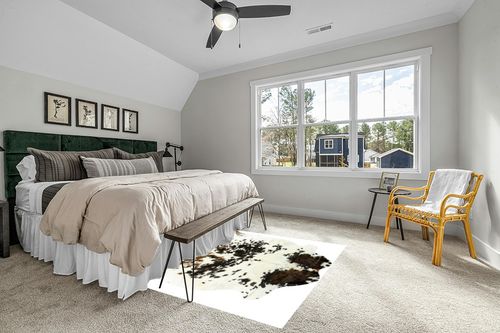 HIDES BAZAAR Light Tricolor Cowhide Rug, Premium Quality Genuine Leather Cow Hide, White, Brown and Black Color Mix Area Rug (6x7 ft) in Grey Traditional Bedroom with King Bed