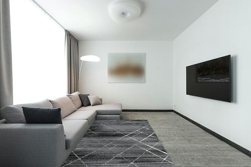 GlowSol Area Rug 5x8 Abstract Line Area Rugs for Living Room,Bedroom,Hallway,Dining Room,Non-Shedding,Non Slip Floor Decoration Carpets,Gray-White,5x8 Feet in Modern Living Room with Grey Couch