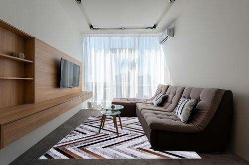 DECOMALL Coronado 8x10ft Area Rugs, Modern Geometric Faux Cowhide Patchwork Rug, Machine Washable Non Slip Carpet for Living Room Bedroom Dinning Room,8x10ft Multi in Grey Living Room with Brown Couch