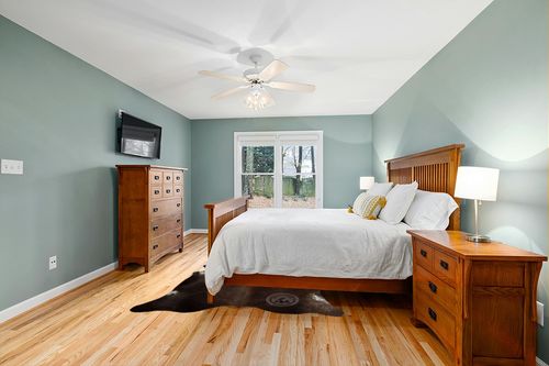 Sunshine Cowhides Genuine Dark Chocolate Brown Cowhide Rug 6 x 7-8 ft. 180 x 240 cm in Teal and Orange Wood Bedroom