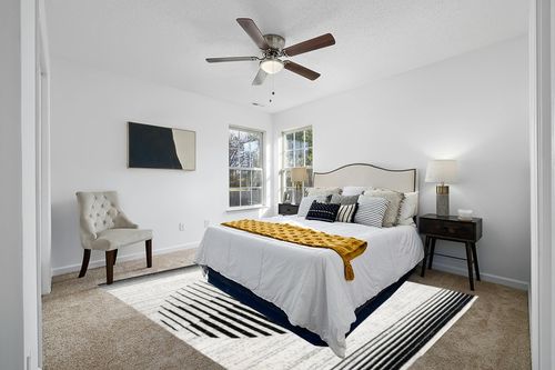 Lockie Abstract Black/White Area Rug Ebern Designs Rug Size: Rectangle 8' x 10' in White and Yellow Modern Bedroom