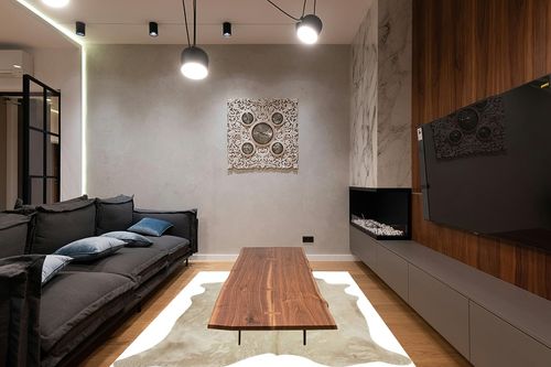 Home Must Haves Large Brazilian Cow Skin Leather Cowhide Rug Black Dark Brown Spotted Cream Grey Gold Aproximately 6' x 7' Feet in Dark Wood Living Room with Black Couch