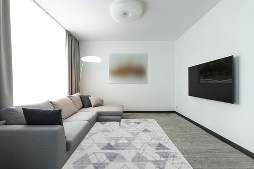 FairOnly Area Rug 6x9 Modern Geometric Rug Grey Abstract Area Rug for Living Room, Dining Room Rug, Bedroom Carpet, Indoor Non Skid Rubber Backed Area Rugs, Grey 6x9 in Modern Living Room with Grey Couch