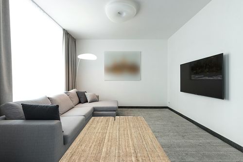 nuLOOM Daniela Farmhouse Chunky Jute Area Rug, 5' x 7' 6", Natural in Modern Living Room with Grey Couch