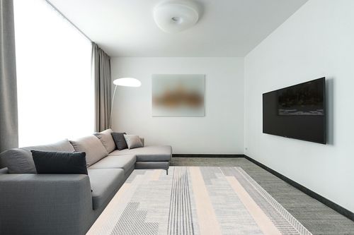 Well Woven Brer Light Blue Abstract Geometric Tribal (7'10" x 9'10") Area Rug in Modern Living Room with Grey Couch