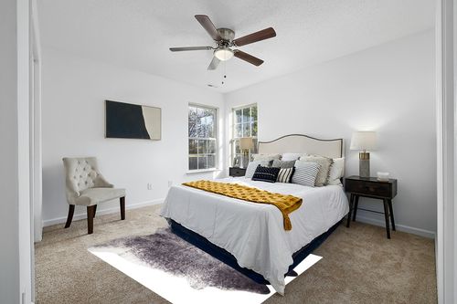Faux Cowhide Printed (Hairless) Rug 5ft x 6.5ft, Black and White Brindle in White and Yellow Modern Bedroom