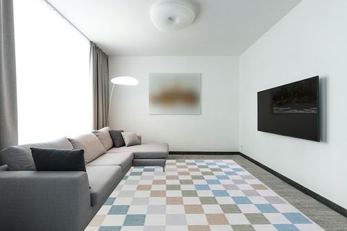 HOMBYS 9x12ft Checkered Area Rug for Living Room Bedroom, Large Modern Floor Carpet for Indoor Dining Room, Multi-Color Checkerboard Home Deco Non-Shedding, Machine Washable, Blue Orange in Modern Living Room with Grey Couch