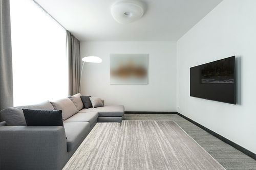 SAFAVIEH Adirondack Collection Area Rug - 8' x 10', Light Grey & Grey, Modern Ombre Design, Non-Shedding & Easy Care, Ideal for High Traffic Areas in Living Room, Bedroom (ADR113C) in Modern Living Room with Grey Couch