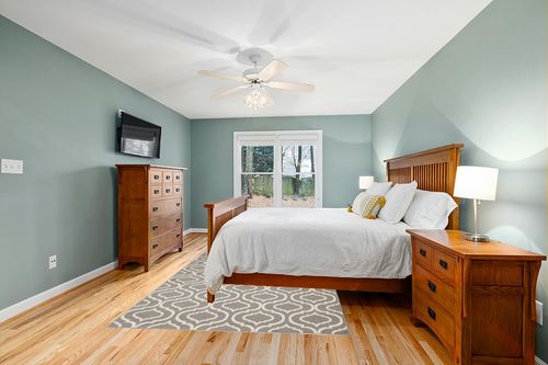 Nourison Jubilant Moroccan Trellis Grey Area Rug, (6' x 9') in Teal and Orange Wood Bedroom