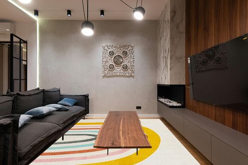 Unique Loom Whimsy Kids Collection Area Rug - Rainbow (7' 10" x 10' Rectangle, Ivory/Yellow) in Dark Wood Living Room with Black Couch
